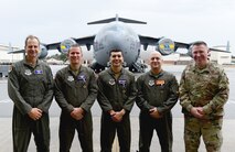 A group photo of the medal recipients.
