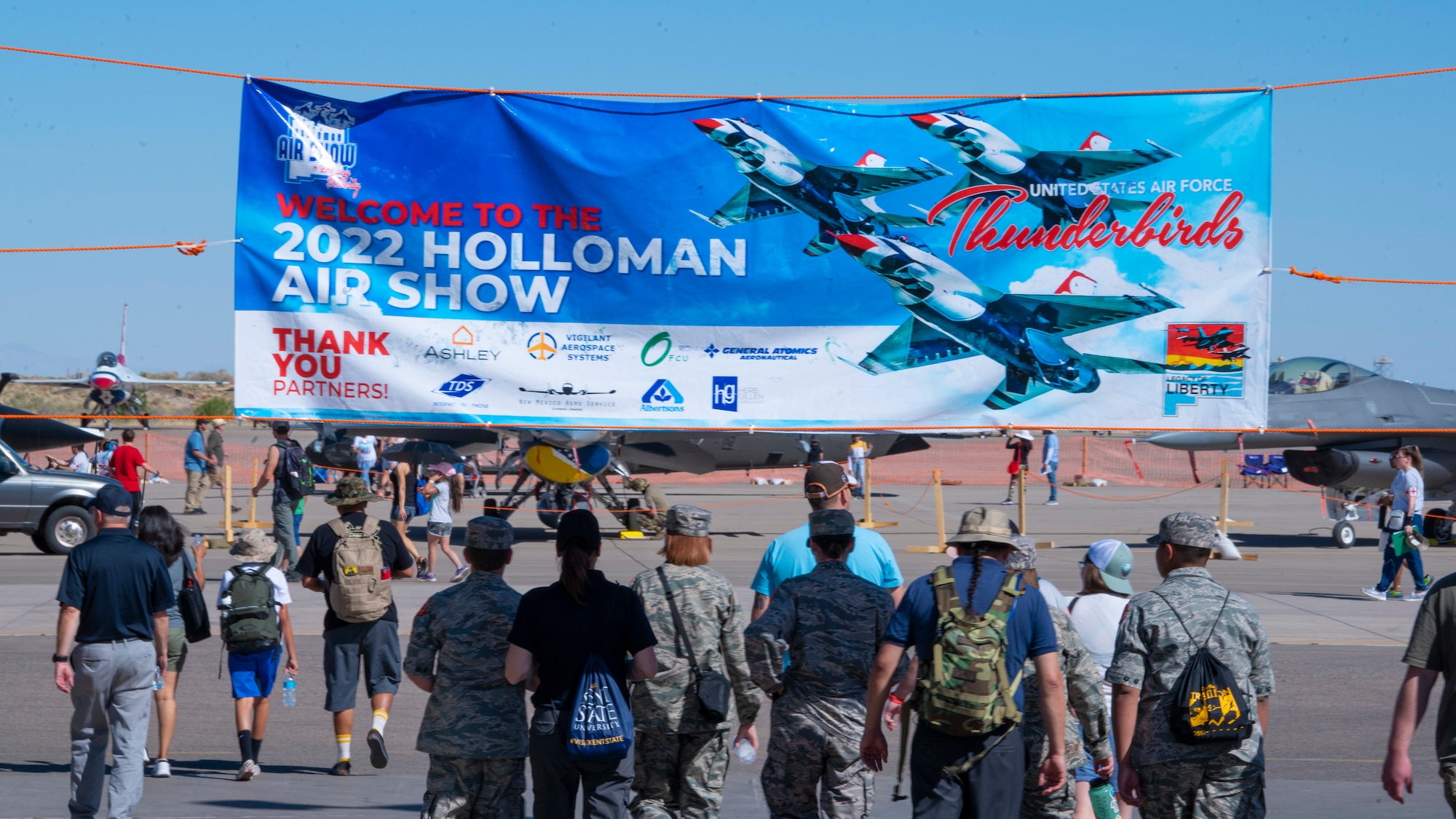 Spectators enter the 2022 Legacy of Liberty Air Show and Open House area May 8, 2022, on Holloman Air Force Base, New Mexico. This air show is the largest event Holloman has hosted in 11 years. (U.S. Air Force photo by Airman 1st Class Nicholas Paczkowski)
