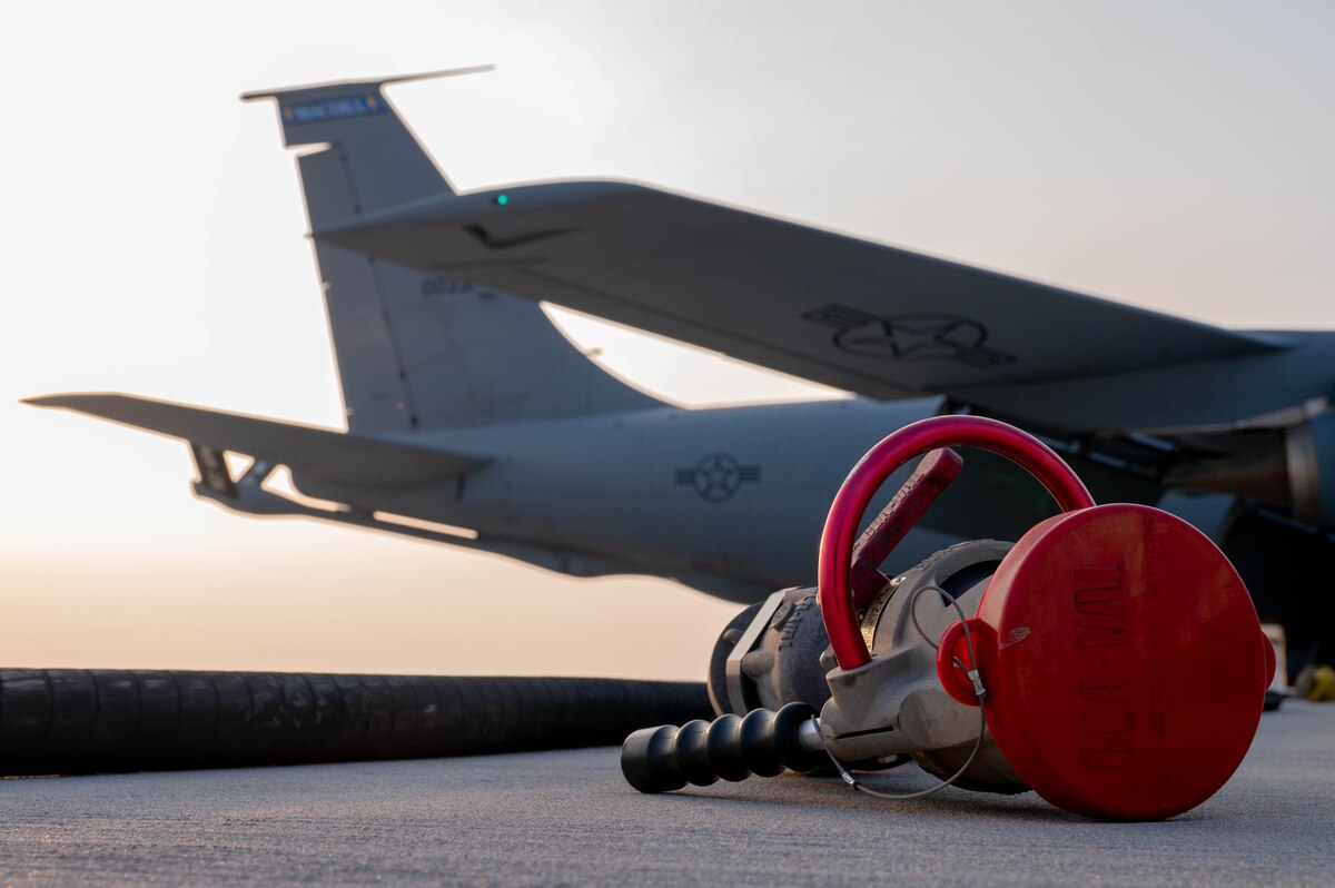 A new fueling hose lays on the ground during a proof-of-concept operation at Al Udeid Air Base.