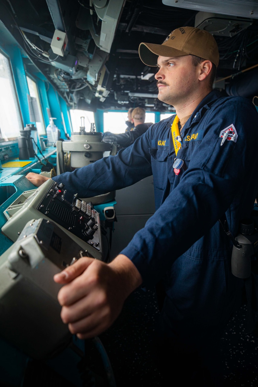 U.S. Navy Lt. j.g. Alec Pagach stands watch as Junior Officer of the Deck (JOOD) aboard the Arleigh Burke-class guided-missile destroyer USS Chung-Hoon (DDG 93). Chung-Hoon, part of the Nimitz Carrier Strike Group, is currently underway in 7th Fleet conducting routine operations. 7th Fleet is the U.S. Navy's largest forward-deployed numbered fleet, and routinely interacts and operates with 35 maritime nations in preserving a free and open Indo-Pacific region.