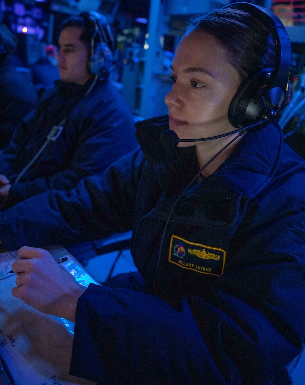 U.S. Navy Lt. Hillary Lutkus tracks and monitors air contacts aboard the Arleigh Burke-class guided-missile destroyer USS Chung-Hoon (DDG 93). Chung-Hoon, part of the Nimitz Carrier Strike Group, is currently underway in 7th Fleet conducting routine operations. 7th Fleet is the U.S. Navy's largest forward-deployed numbered fleet, and routinely interacts and operates with 35 maritime nations in preserving a free and open Indo-Pacific region.