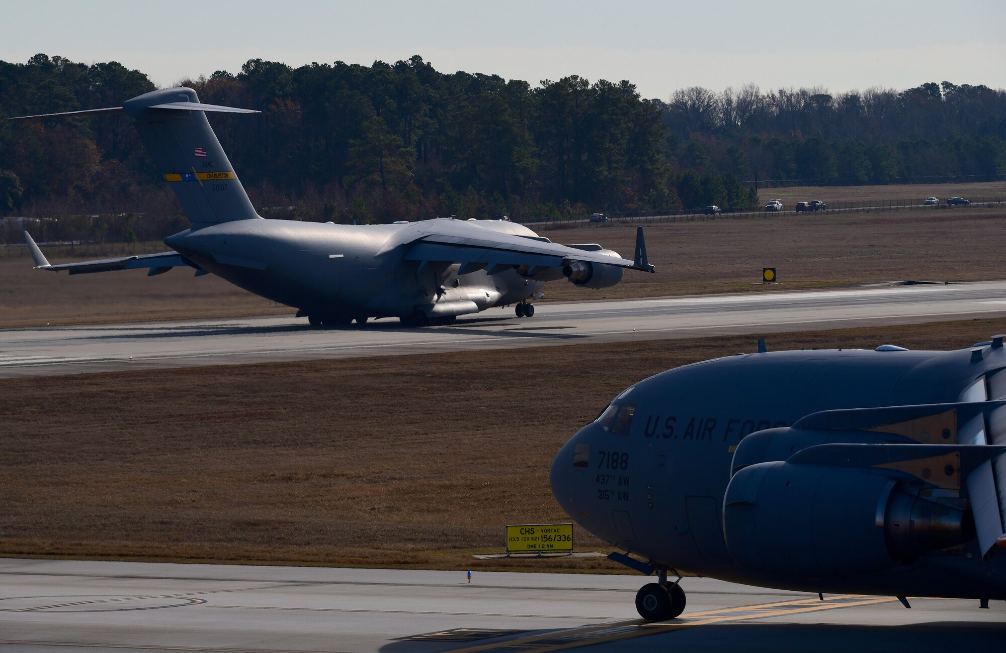 A aircraft prepares to take off on a runway.