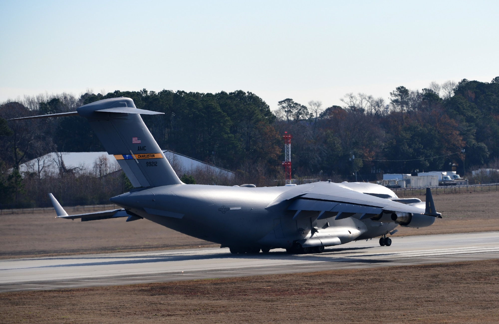 A aircraft prepares to take off on a runway.