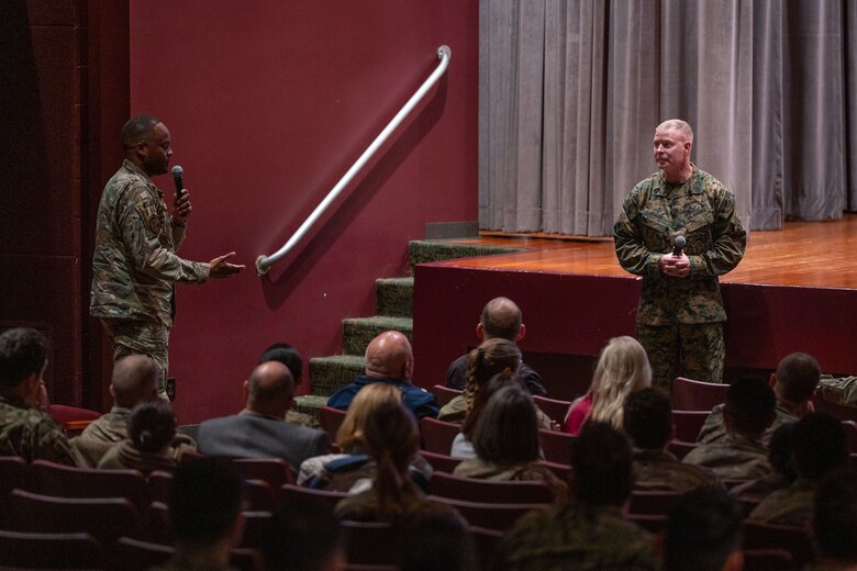 U.S. Space Force 1st Lt Kyle Norbert, Combined Force Space Component Command (CFSCC) commander’s action group support officer, asks a question to U.S. Marine Corps Master Gunnery Sgt. Scott Stalker, United States Space Command command senior enlisted leader, during an All Call for CFSCC members at the base theater on Vandenberg Space Force Base, Calif., Jan. 4, 2023. Norbert will soon fall under the 533rd Training Squadron where he will receive training to become a space operator. USSPACECOM conducts operations in, from, and to space to deter conflict, and if necessary, defeat aggression, deliver space combat power for the Joint and Combined force, and defend U.S. vital interests with allies and partners. (U.S. Space Force photo by Tech. Sgt. Luke Kitterman)