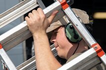 An Airman inspects a C-17 Globemaster III