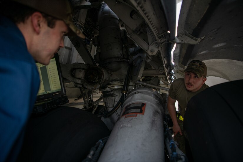 Airmen inspect a C-17 Globemaster III