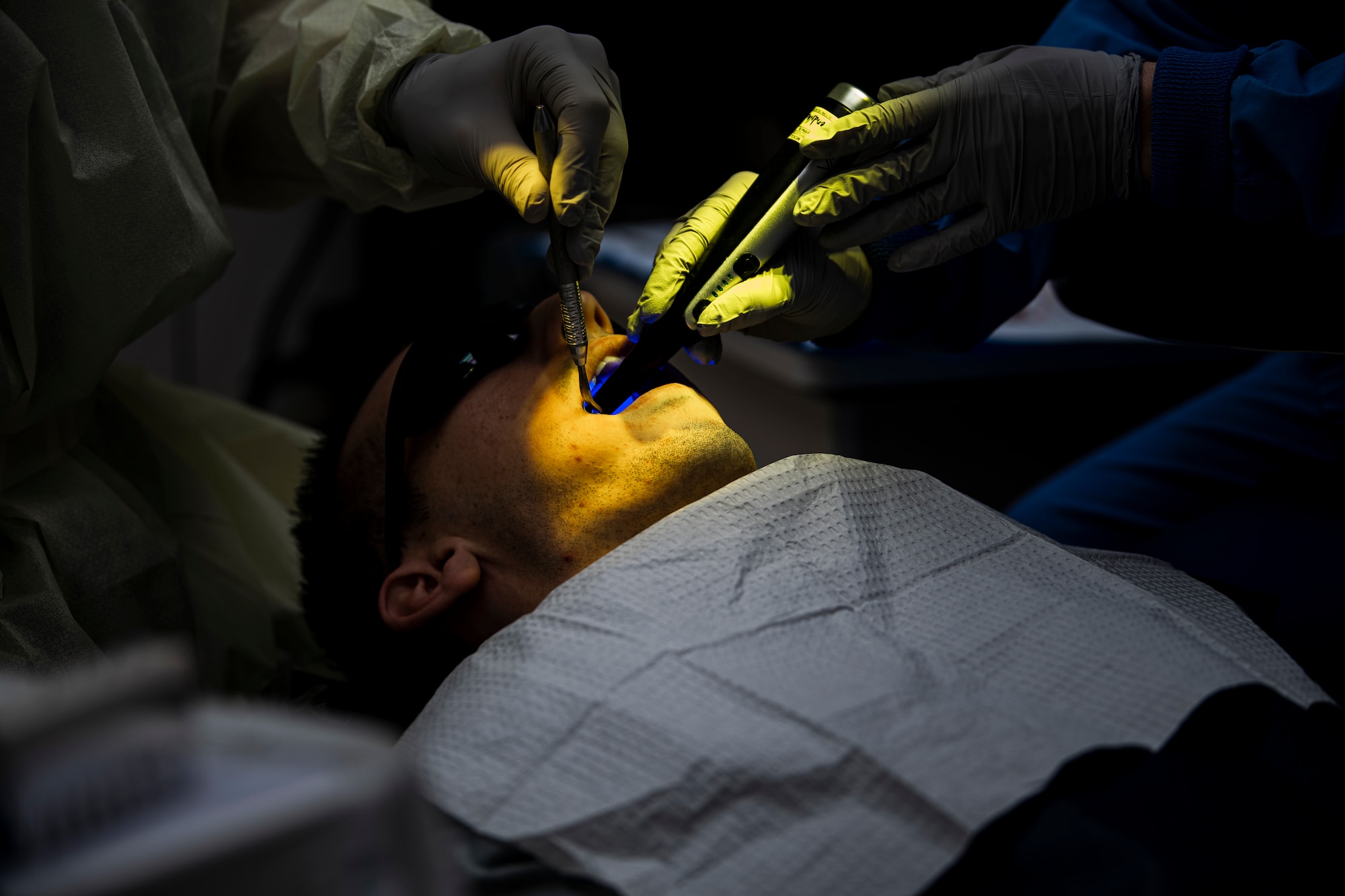 Dentist works on patient