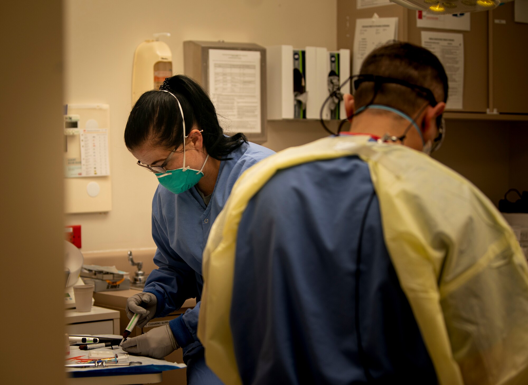 Dentist works on patient