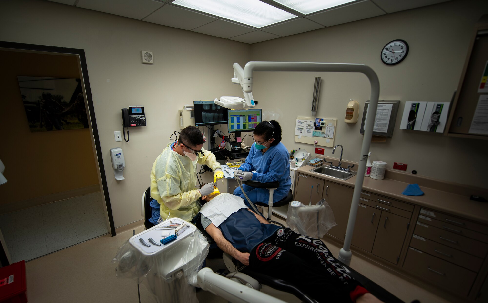 Dentist works on patient