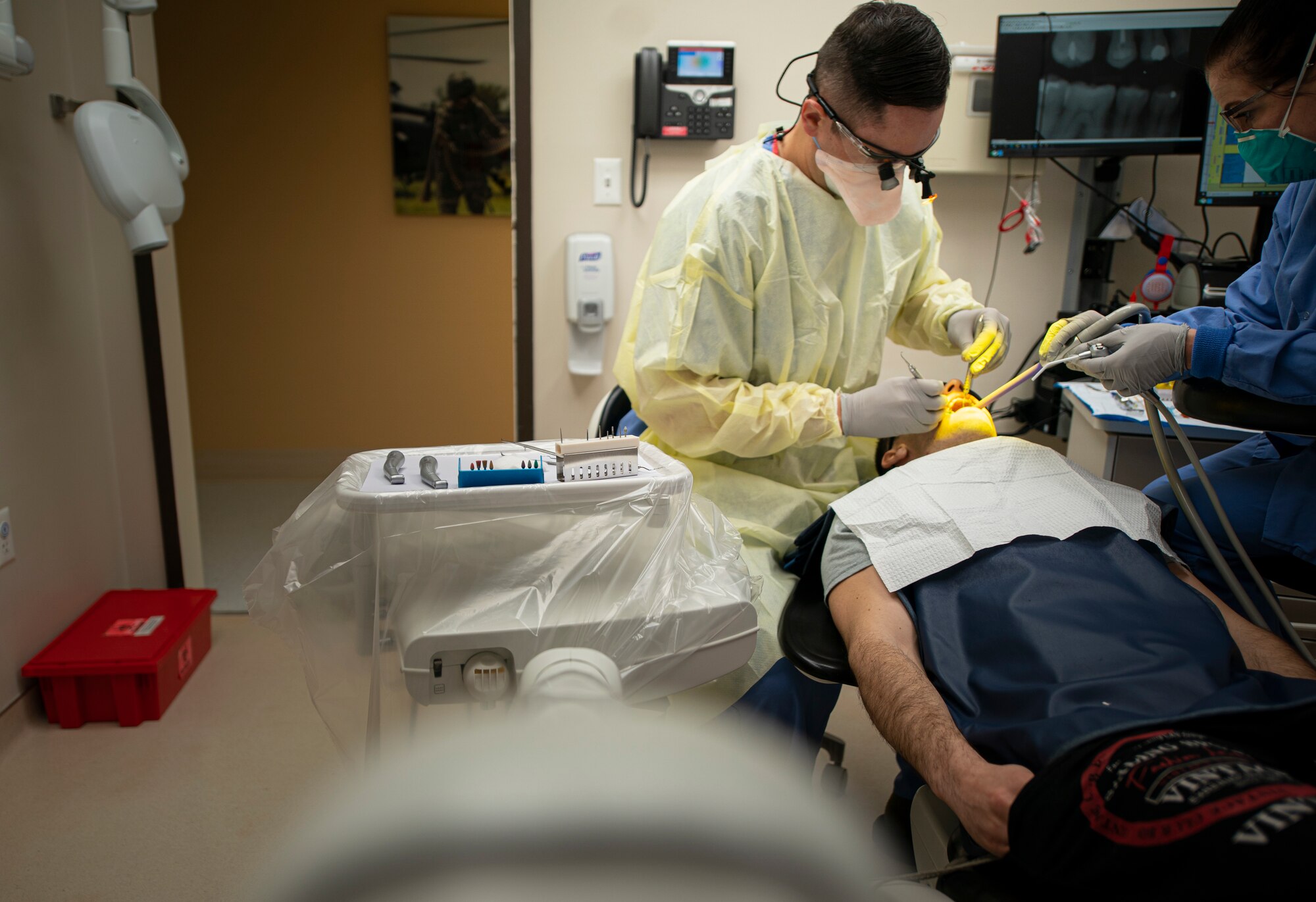 Dentist works on patient