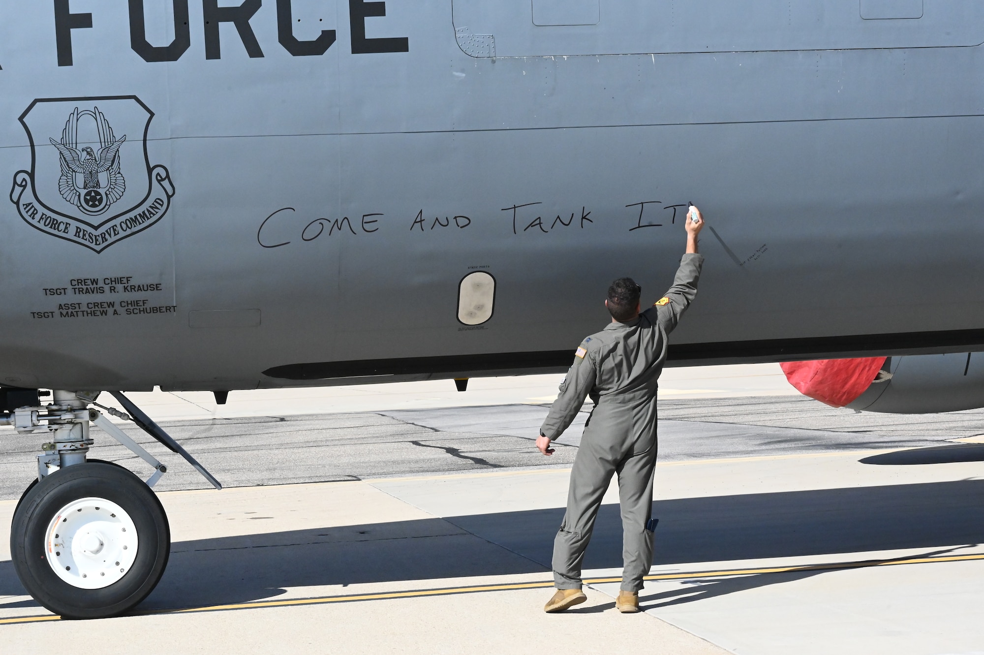 Man writing on jet