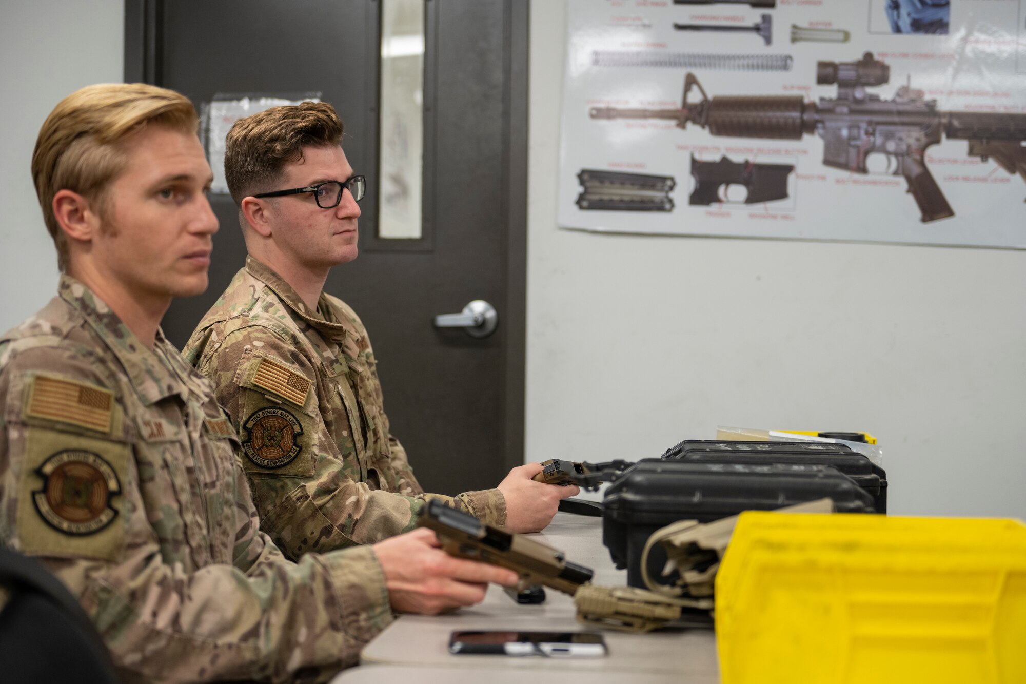 Airmen participate in an orientation and mechanical training.