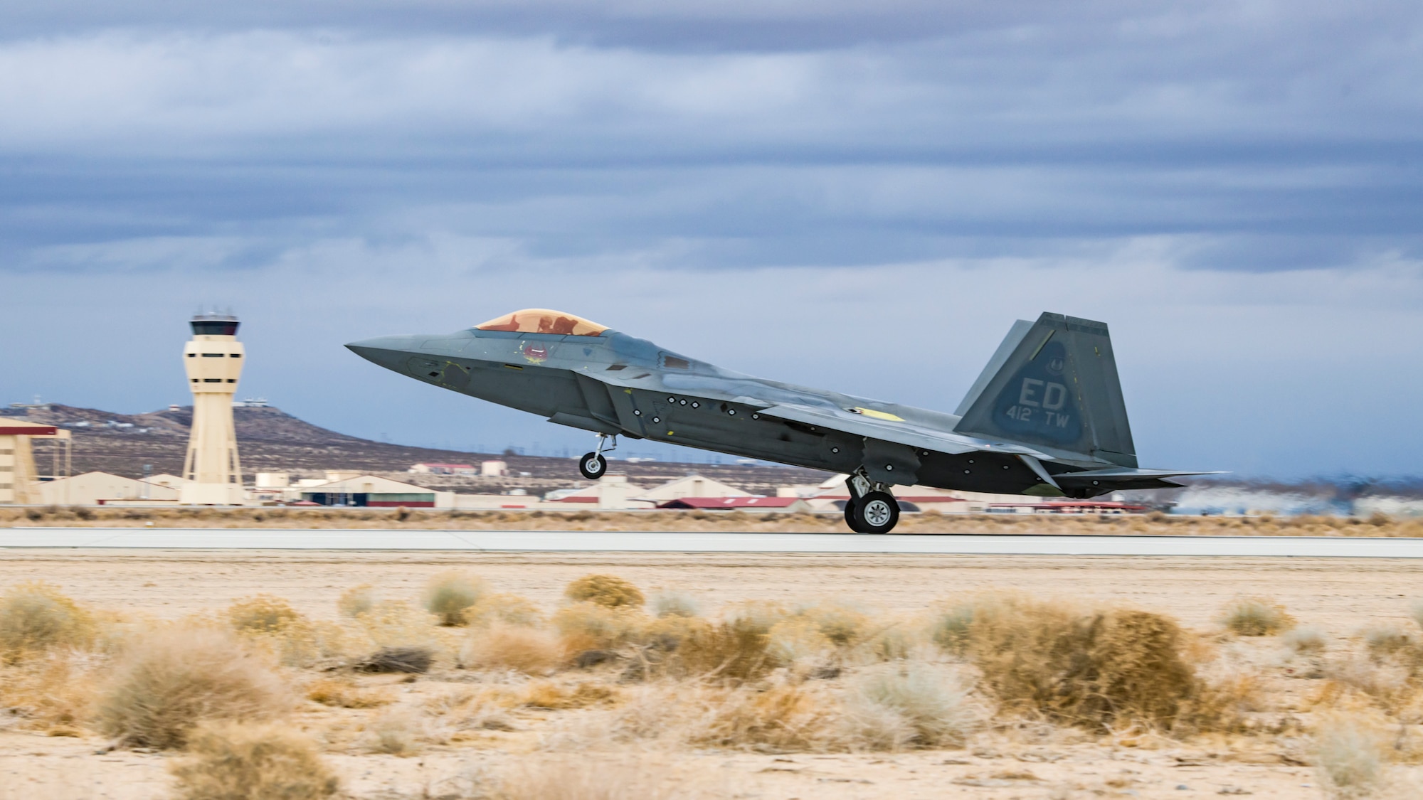 An F-22 Raptor assigned to the 411th Flight Test Squadron, 412th Test Wing, takes off from Edwards Air Force Base, California, Jan, 4, 2023. Flight operations resumed this week at Edwards AFB following the holidays. (Air Force photo by Giancarlo Casem)