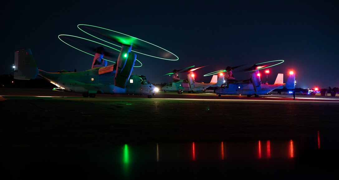 U.S. Marine Corps MV-22 Osprey aircraft assigned to Marine Medium Tiltrotor Squadron 162 (Reinforced), 26th Marine Expeditionary Unit, prepare to take-off prior to conducting a simulated raid during Marine Expeditionary Unit Exercise I at Marine Corps Auxiliary Landing Field Bogue, North Carolina, Dec. 20, 2022. The raid was the culminating MAGTF mission for the exercise. Through continued training and preparation, the 26th MEU will continue to be the nation’s premier expeditionary force-in readiness and remains ready and able to respond at a moment’s notice.