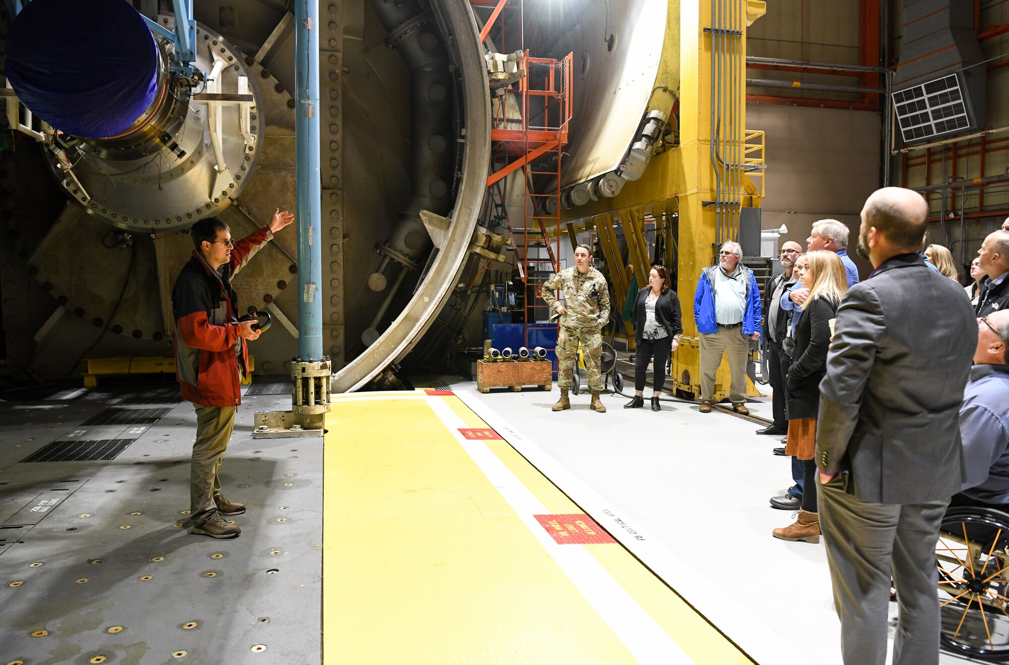 Nate Campbell, Arnold Engineering Development Complex lead test engineer for the 717th Test Squadron, briefs technical leaders with the Air Force Test Center in the C-2 engine test cell.