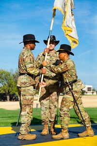 Command Sgt. Maj. Ronald B. Oyardo, 15th, Finance Support Battalion (right), passes the colors to Col. Anthony L. Wilson Sr, commander, 1st Cavalry Division Sustainment Brigade (left), symbolizing Lt. Col. Ralph Schneider IV assumption of command of the 15th Finance Battalion on August 17, 2022, at Fort Hood, TX. The activation ceremony is significant because the 15th Finance Battalion, originally called the 15th Finance Company, was assigned to the 1st Cavalry Division when it was first created on March 15, 1971, before it was redesignated.  (Photo by U.S. Army SGT Froylan Grimaldo, 1st Cavalry Division Public Affairs)