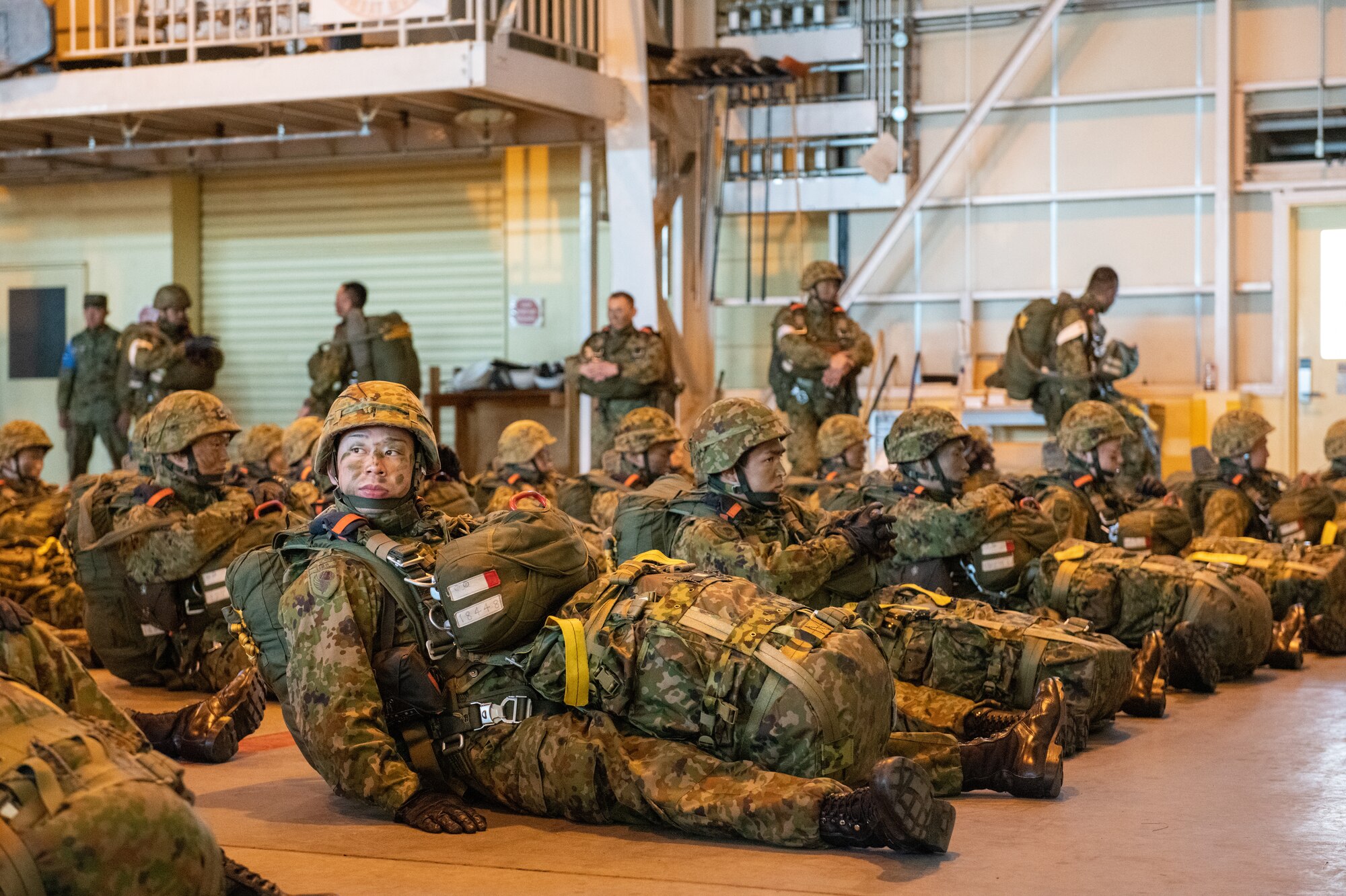 paratroopers sit on the floor
