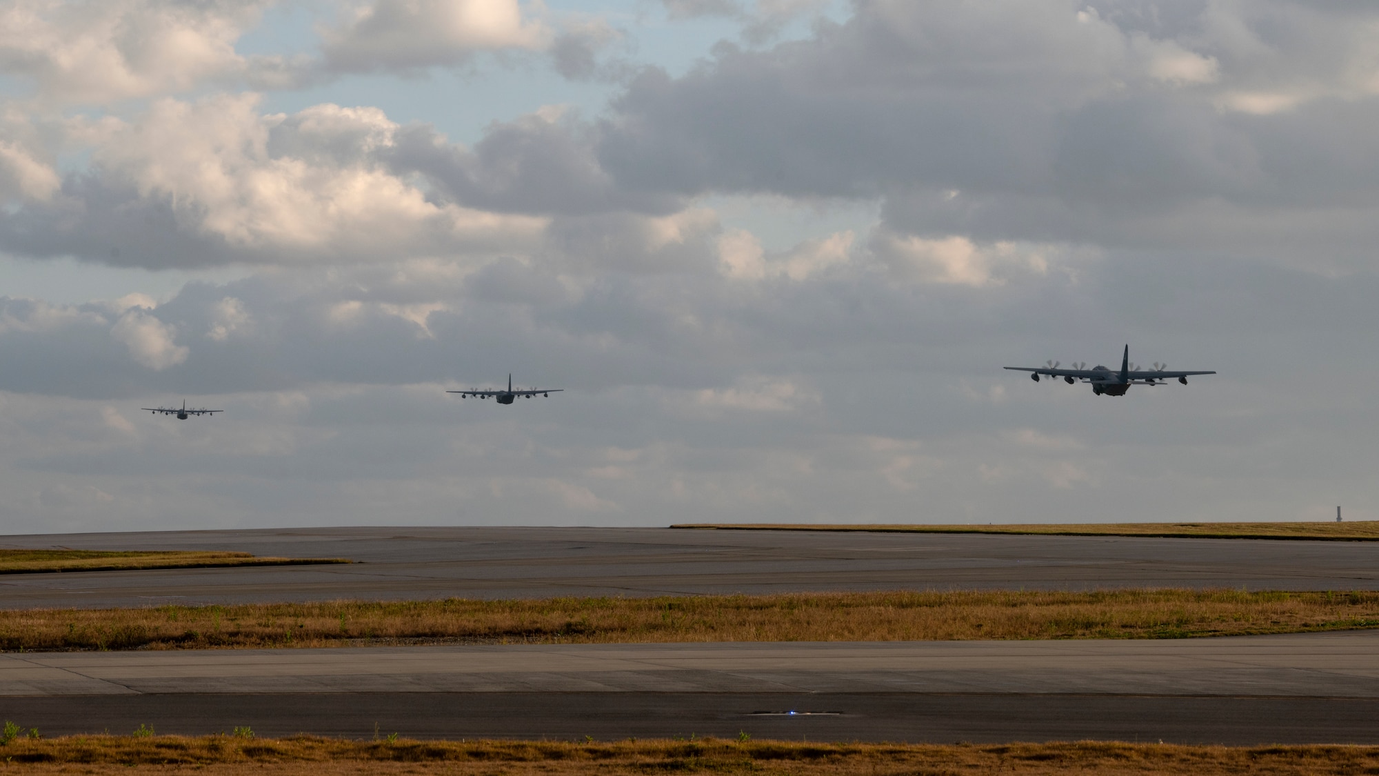 Three aircraft fly in formation.