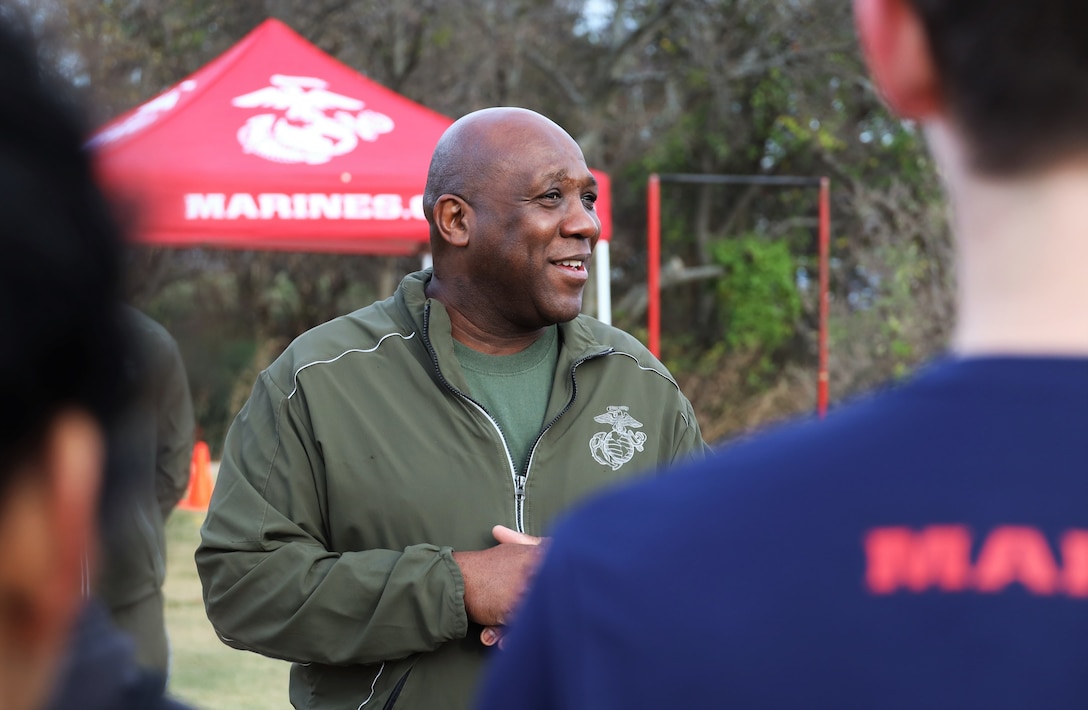 U.S. Marine Corps veteran Ronald L. Green, the 18th Sergeant Major of the Marine Corps, motivates poolees from Recruiting Station Dallas before their initial strength test in efforts of Operation Semper Fi at Calf Pasture Park in Cedar Hill, Tx, Dec. 11, 2021. Operation Semper Fi is a call of action to reconnect Marine veterans and to build on the pride they have for the Corps.