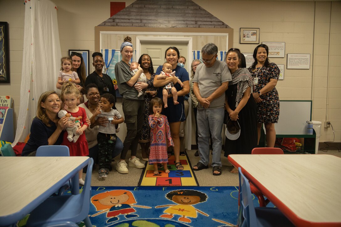 Families and New Parent Support Program staff attend Play Morning in the new classroom at Marine Corps Air Station Beaufort, South Carolina, Dec. 8, 2022. The New Parent Support Program offers services to families, such as their weekly Play Mornings, in-home visits and Baby Bootcamp classes, which helps parents build strong, healthy bonds with their children and allows them to form relationships with other families in the community. (U.S. Marine Corps photo by Sgt. Cheyeanne Campbell)
