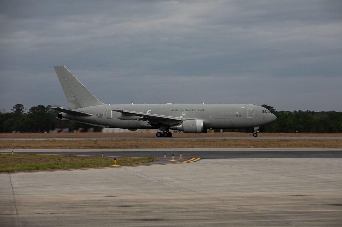 An Italian Air Force KC-46 Pegasus carrying members of the Italian Air Force, takes off on the flightline at Marine Corps Air Station Beaufort, South Carolina, Dec. 14, 2022. VMFAT-501 helped support the Italian Navy F-35B pilots and maintainers and assisted in the development of their organic F-35B training program that will be located at Amendola Air Base, Italy. (U.S. Marine Corps photo by Cpl. Hernan Rodriguez)