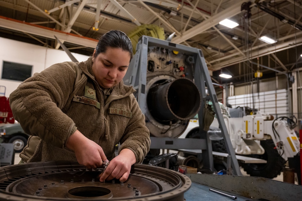 Senior Airman Cynthia Trevino, an aerospace propulsion mechanic with the 139th Maintenance Squadron, Missouri Air National Guard, takes apart a C-130 Hercules propeller at Rosecrans Air National Guard Base, Jan. 7, 2023. Trevino enlisted when she was 17 years old, and has been with the 139th Airlift Wing for three years. (U.S. Air National Guard photo by Senior Airman Janae Masoner)