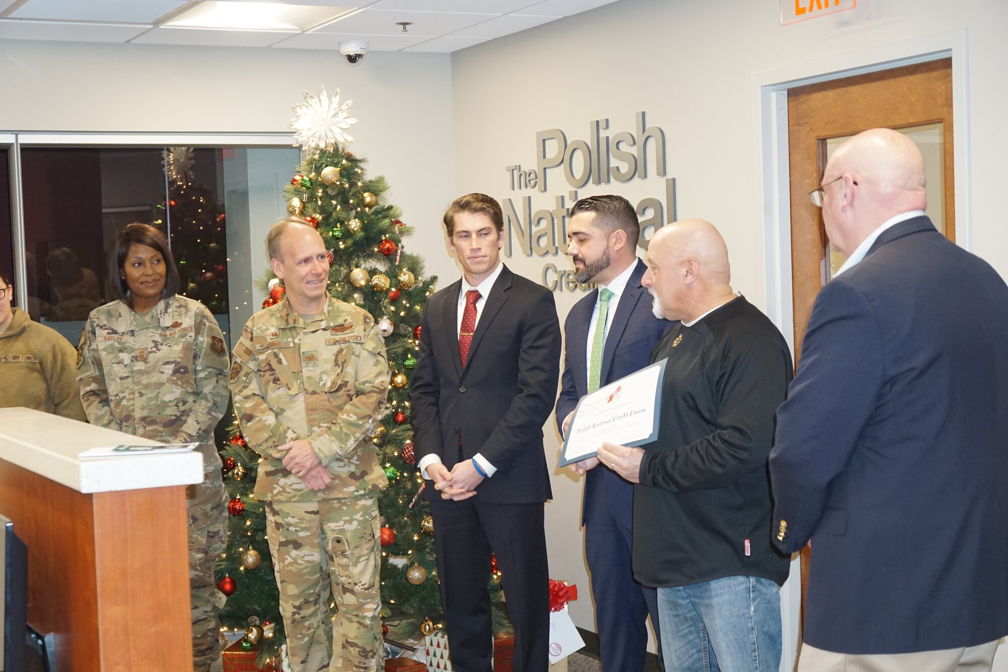 On Dec 21 Colonel Joseph Janik, 439 AW commander and Chief Master Sgt. Rosiline Ratliff, 439 AW command chief attended a recognition event at Polish National Credit Union.