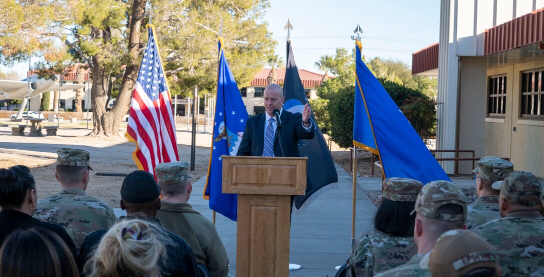 Mr. William Brown, Community Support Coordinator emcees for the new Helping Agencies facility ribbon cutting ceremony at Edwards Air Force Base, California, Jan. 6.