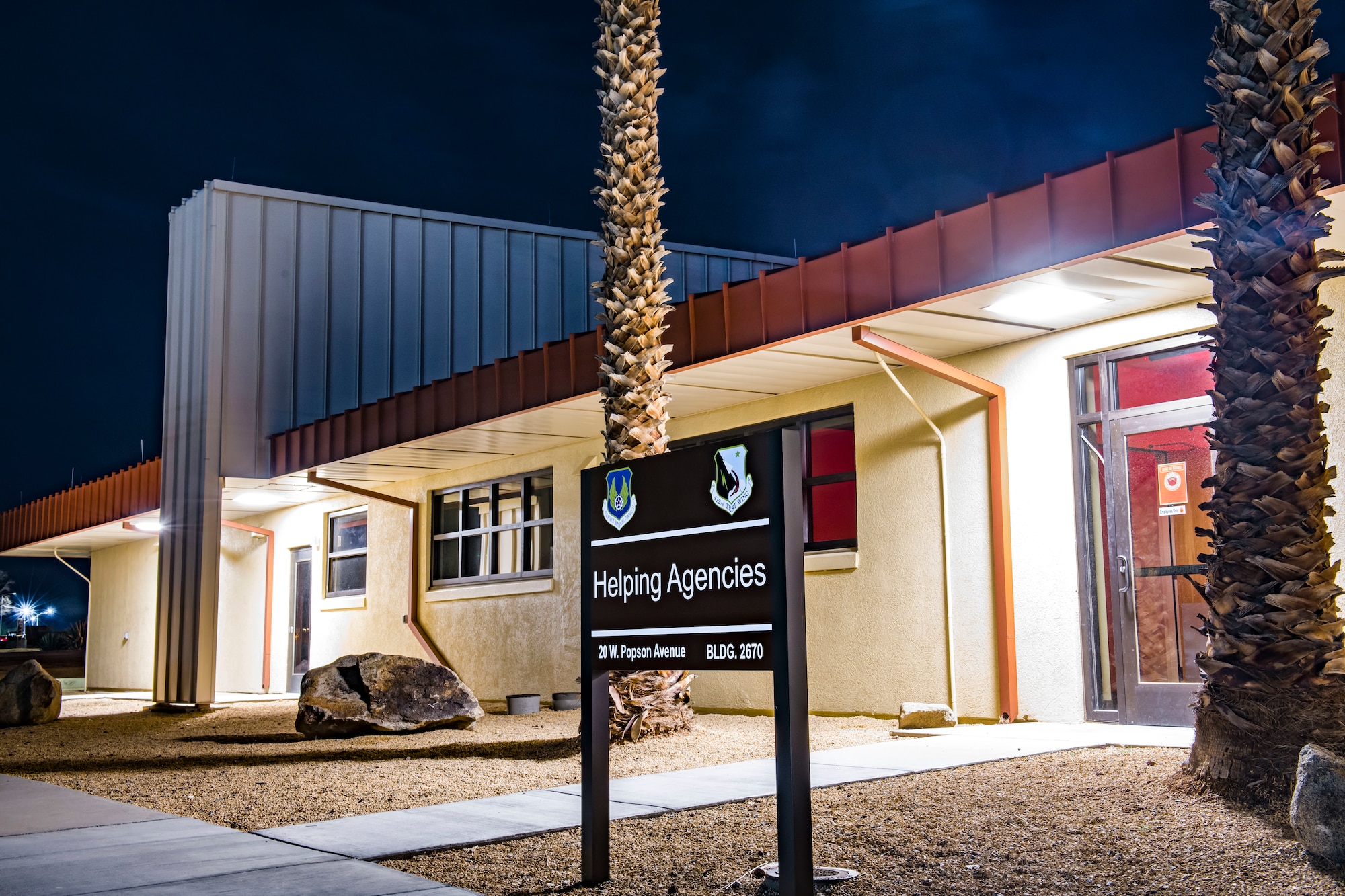A twilight photograph of the new Helping Agencies facility at Edwards Air Force Base, California.