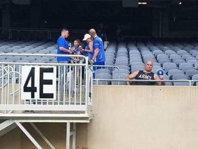 Army Sgt, David Crook holds the discus he sent sailing into the stands at Soldier Field during the 2017 Department of Defense Warrior Games in Chicago