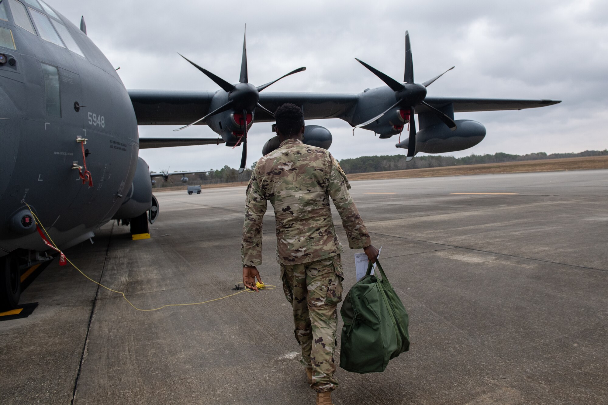 Airman walks to aircraft