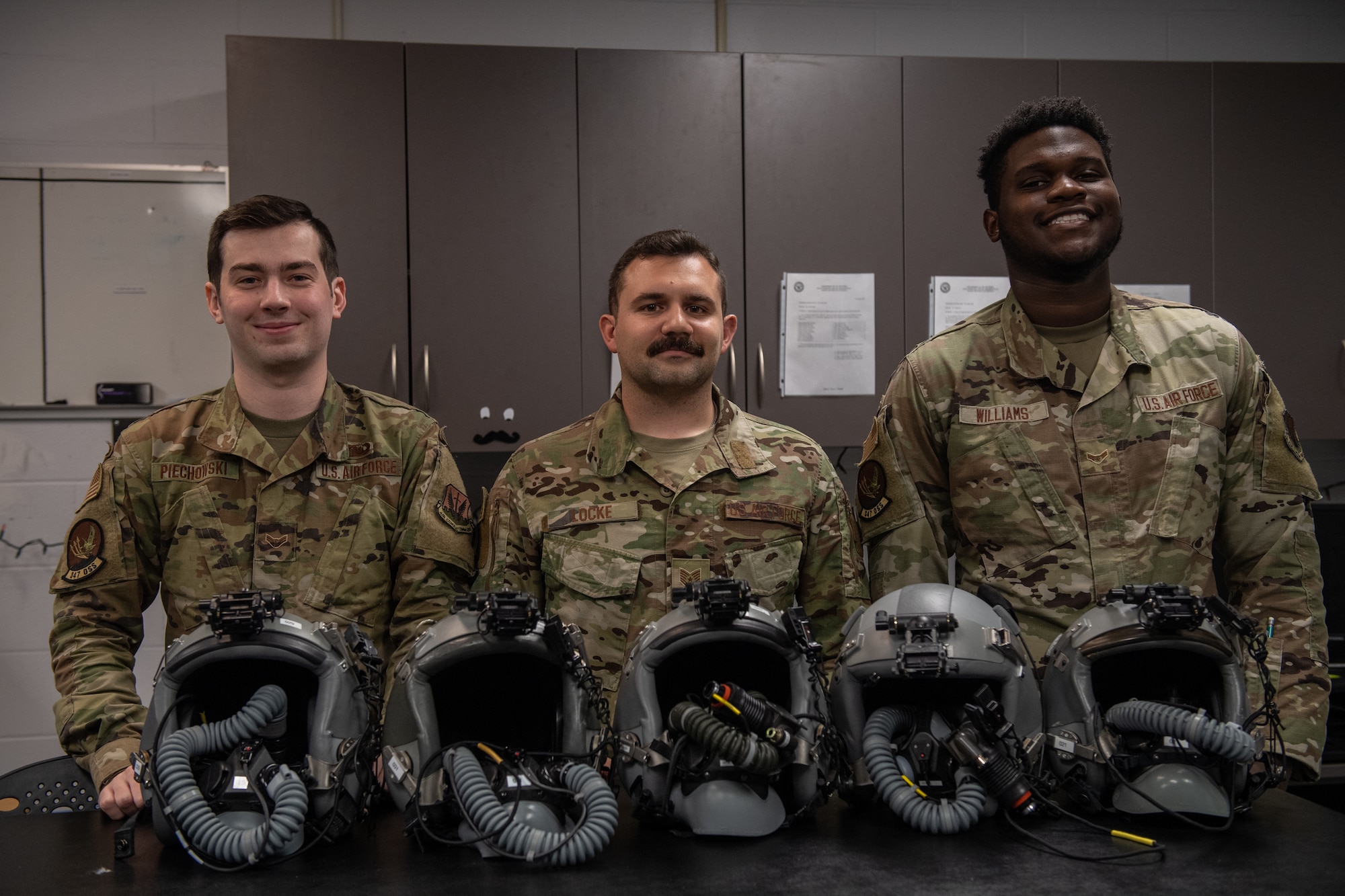 Airmen pose for photo