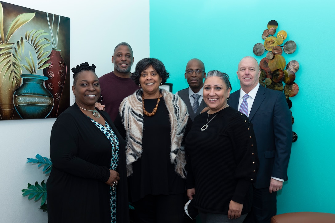 Helping Agencies committee members pose for a photo in the new Helping Agencies facility at Edwards Air Force Base, California, Jan. 6.