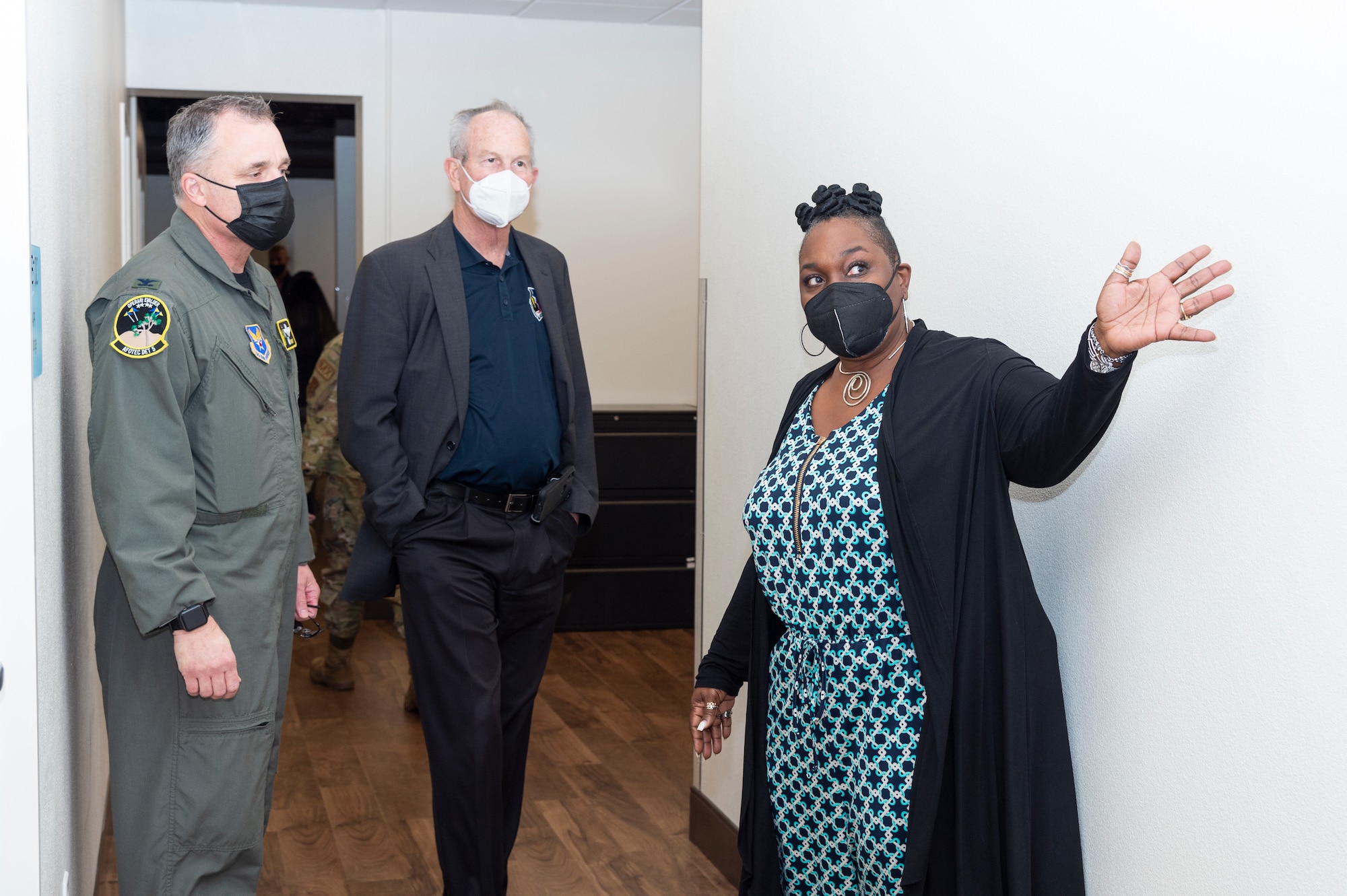 Ms. Ebony Graves, Sexual Assault Victim Advocate, provides a tour for Col. Keith Butler, Commander, AFOTEC Detachment 5 and Dr. David Smith, Director, AF Plant 42 through the new Helping Agencies facility at Edwards Air Force Base, California, Jan. 6.