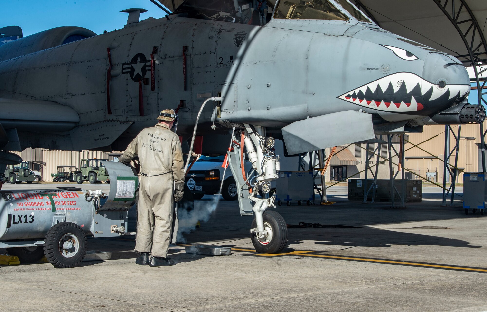 man standing in front of an aircraft