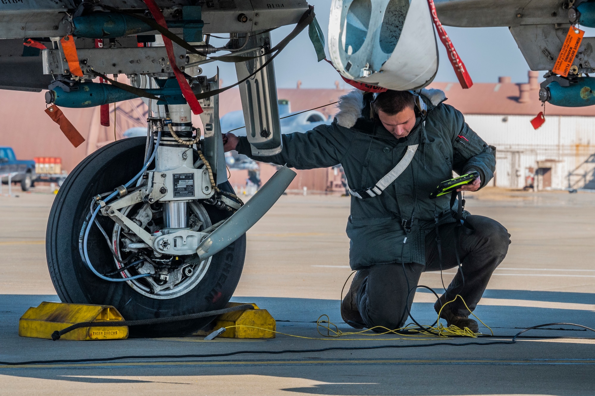 U.S. Air Force Senior Airman Tristan Barker, 25th Fighter Generation Squadron crew chief, performs post flight diagnostics on an A-10 Thunderbolt II at Osan Air Base, Republic of Korea, Jan. 4, 2023.