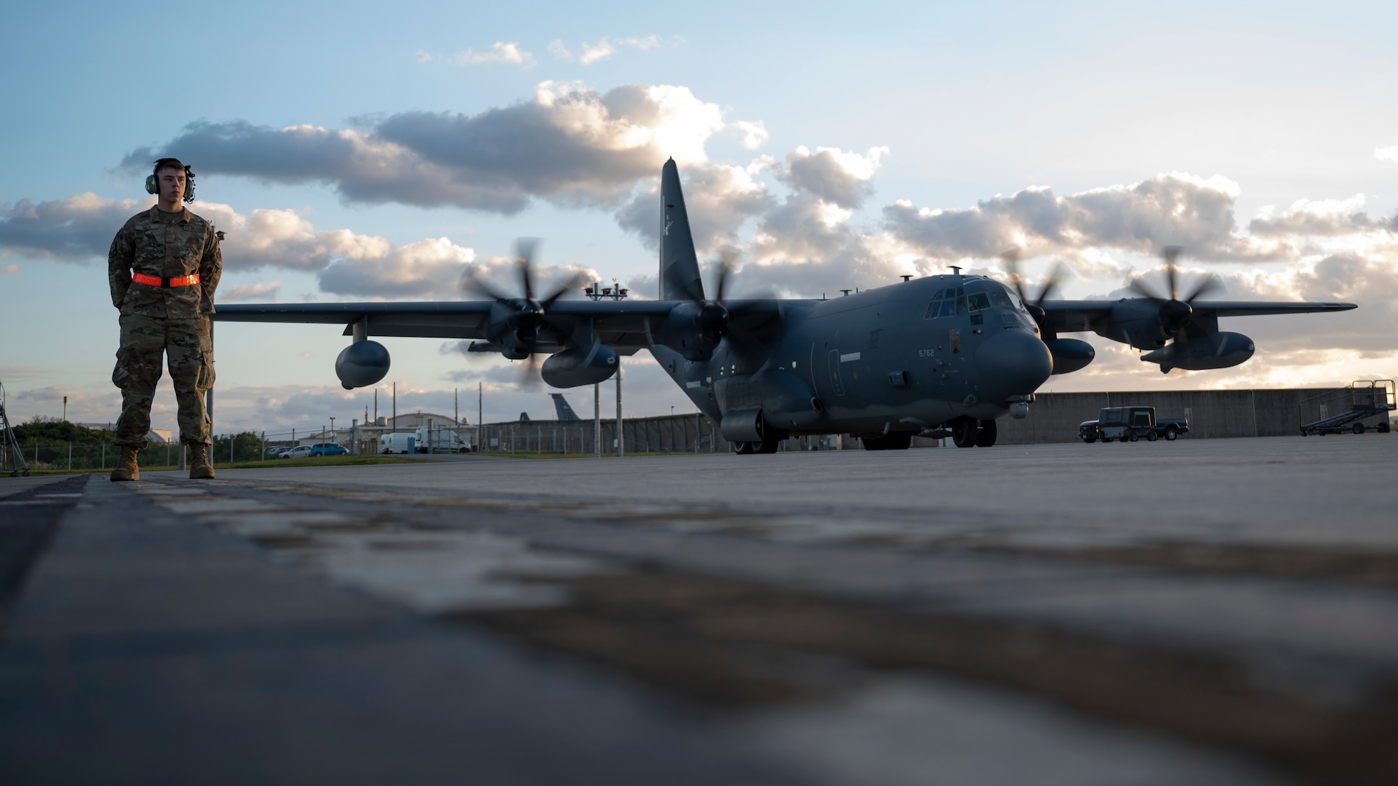 An Airman directs an aircraft.