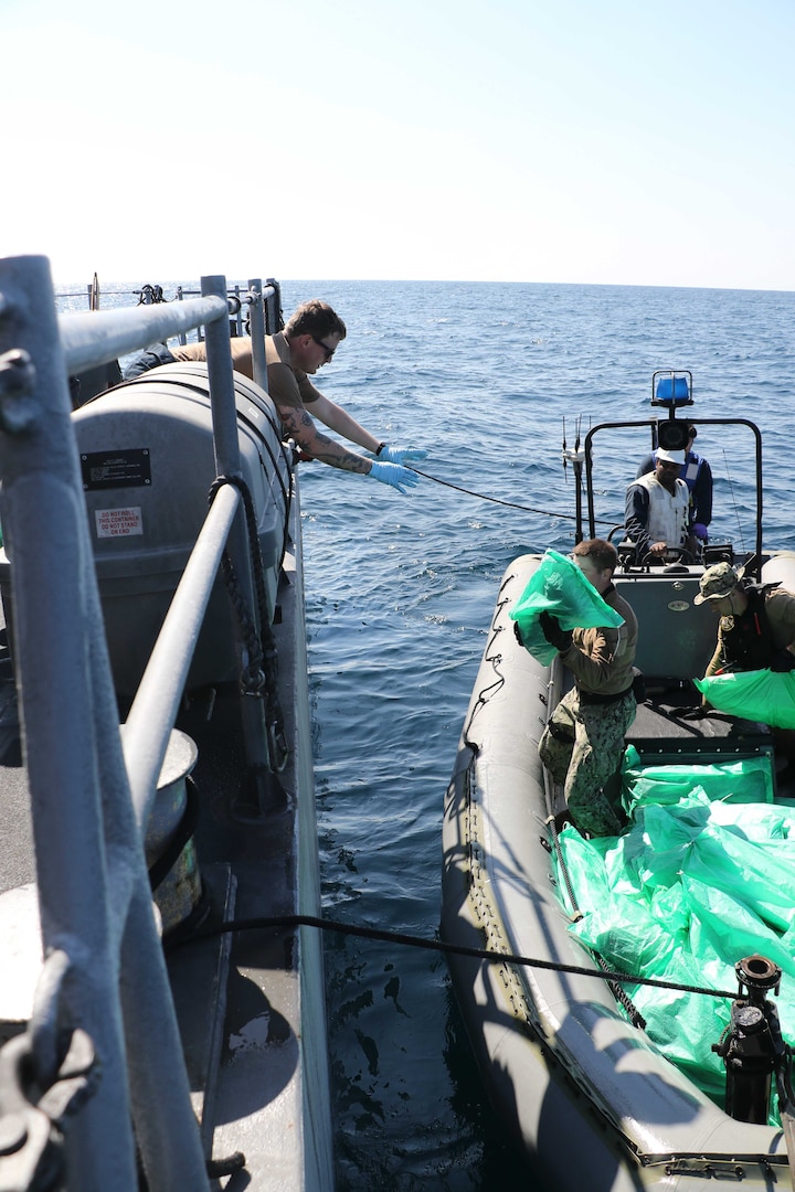 TAMPA, Fla. - On Jan. 6, US Central Command forces intercepted a stateless dhow in the Gulf of Oman smuggling more than 2,000 AK-47 assault rifles while transiting international waters from Iran to Yemen.
The vessel was sailing on a route historically used to traffic weapons to the Houthis in Yemen. A team from the USS Chinook patrol coastal ship boarded the vessel with support from the Cyclone-class patrol ship USS Monsoon and the guided-missile destroyer USS The Sullivans.