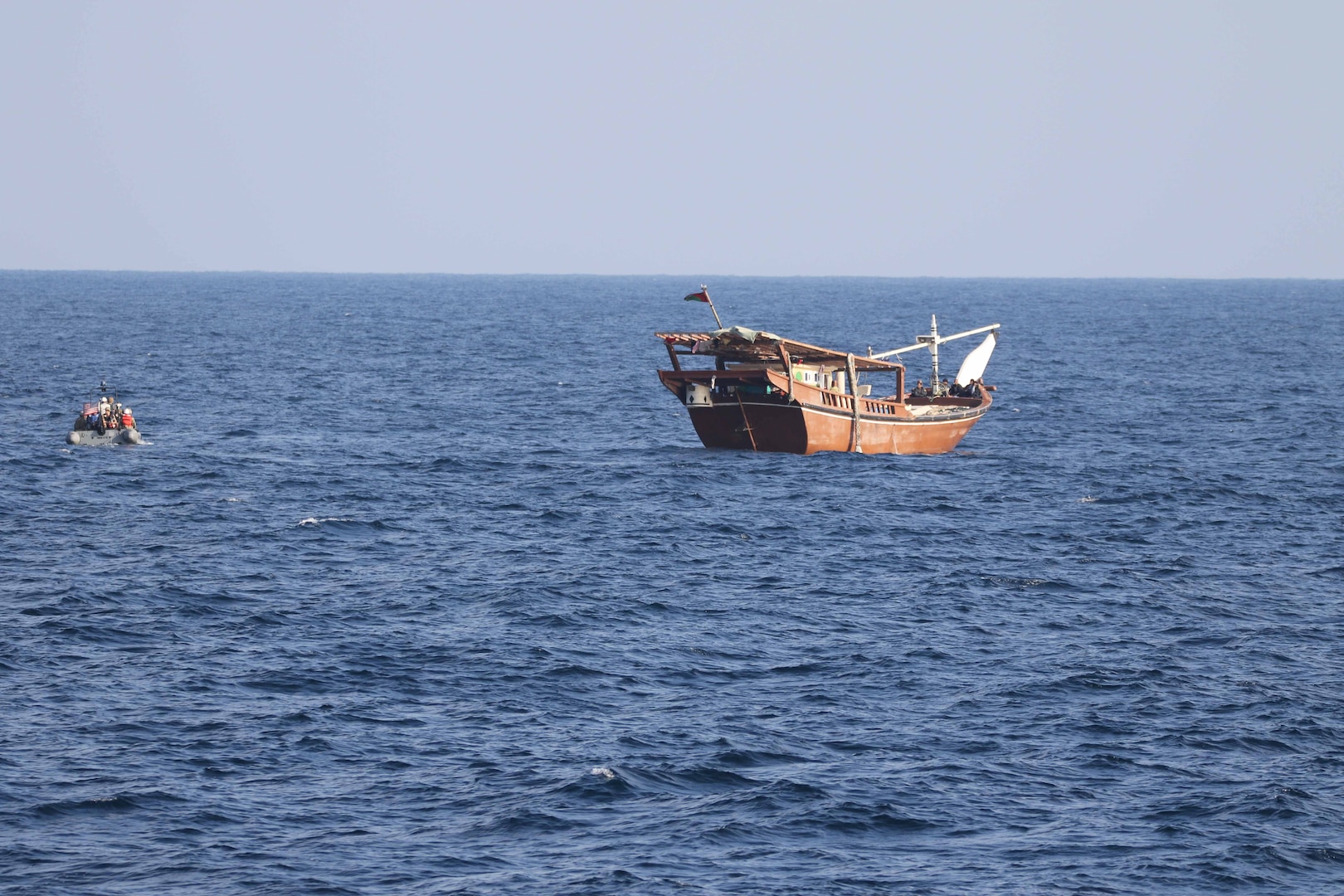 TAMPA, Fla. - On Jan. 6, US Central Command forces intercepted a stateless dhow in the Gulf of Oman smuggling more than 2,000 AK-47 assault rifles while transiting international waters from Iran to Yemen.
The vessel was sailing on a route historically used to traffic weapons to the Houthis in Yemen. A team from the USS Chinook patrol coastal ship boarded the vessel with support from the Cyclone-class patrol ship USS Monsoon and the guided-missile destroyer USS The Sullivans.