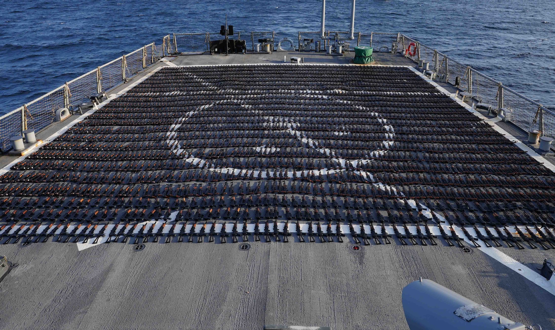 TAMPA, Fla. - On Jan. 6, US Central Command forces intercepted a stateless dhow in the Gulf of Oman smuggling more than 2,000 AK-47 assault rifles while transiting international waters from Iran to Yemen.
The vessel was sailing on a route historically used to traffic weapons to the Houthis in Yemen. A team from the USS Chinook patrol coastal ship boarded the vessel with support from the Cyclone-class patrol ship USS Monsoon and the guided-missile destroyer USS The Sullivans.