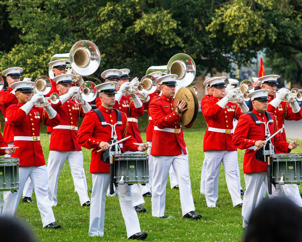Marines with “The Commandant’s Own,” U.S. Marine Drum and Bugle Corps, perform during a Sunset Parade at the Marine Corps War Memorial, Arlington, Va., Jul 5, 2022. The hosting official for the evening was General Mark H. Clingan, Assistant Deputy Commandant, Combat Development and Integration, and Lieutenant Col. Joseph Shusko, United States Marine Corps (Ret.), was the guest of honor.