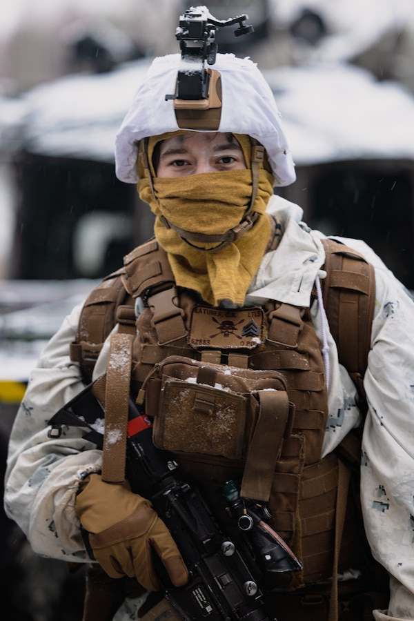 U.S. Marine Corps Sgt. Christine Latuner, platoon Sgt, with Combat Logistics Battalion 6 (CLB-6), Combat Logistics Regiment 2, 2nd Marine Logistics Group  leads her team during a littoral reconnaissance patrol for Freezing Winds 22 in Syndalen, Finland, Nov. 27, 2022. Task Force Red Cloud, headquartered by elements of CLB-6, is deployed to Finland in support of Exercises SYD 2022 and Freezing Winds 2022 to enhance U.S. and Finnish select interdependence in the maritime domain; solidify bilateral maritime maneuver within the Finnish littoral environment; and foster strong relationships between U.S. Marine Corps and Finnish Defense Force sustainment units. (U.S. Marine Corps photo by Cpl. Jackson Kirkiewicz)