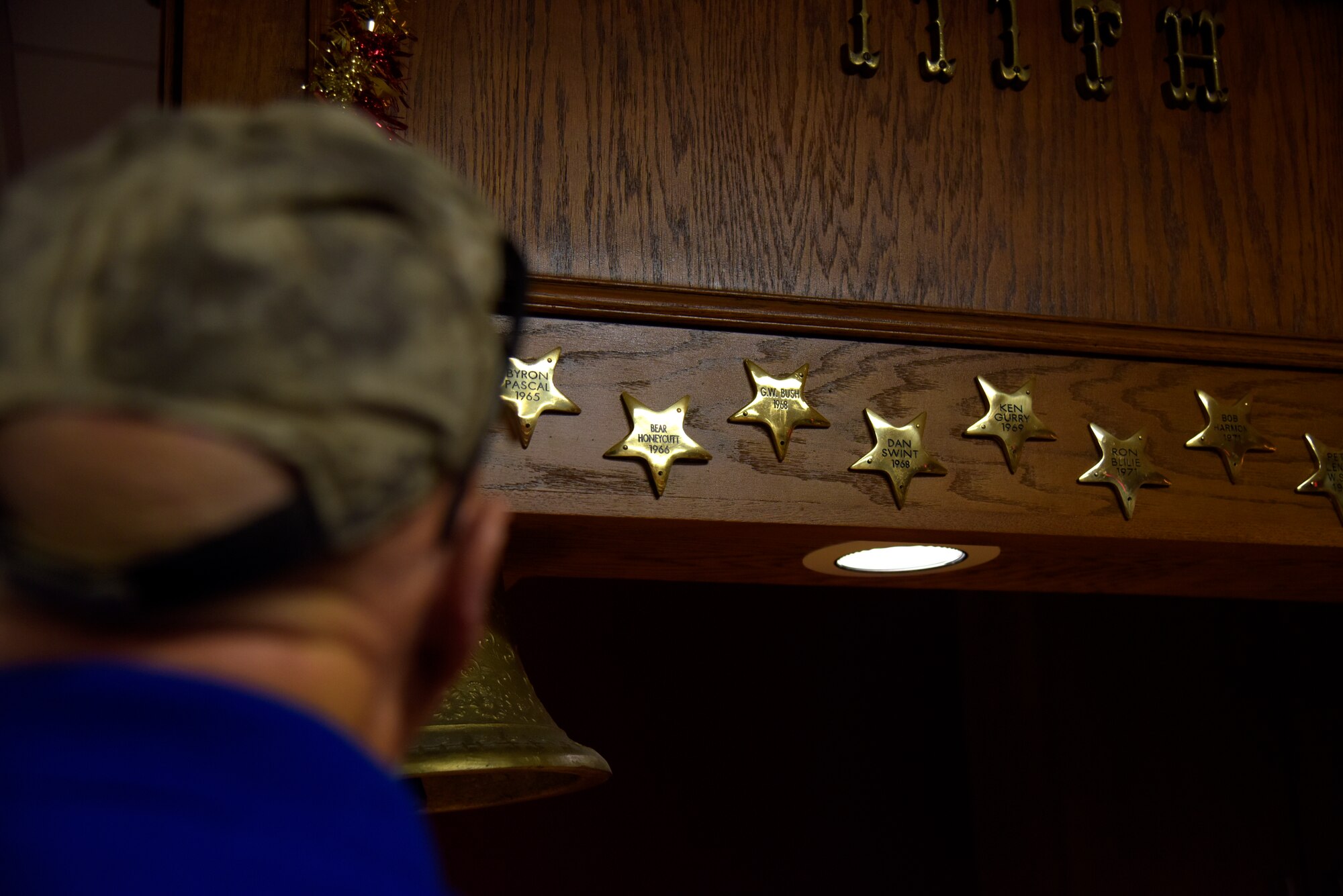 Lt. Col (ret.) Mason Honeycutt looks at his star in the Heritage Room at Ellington Field.