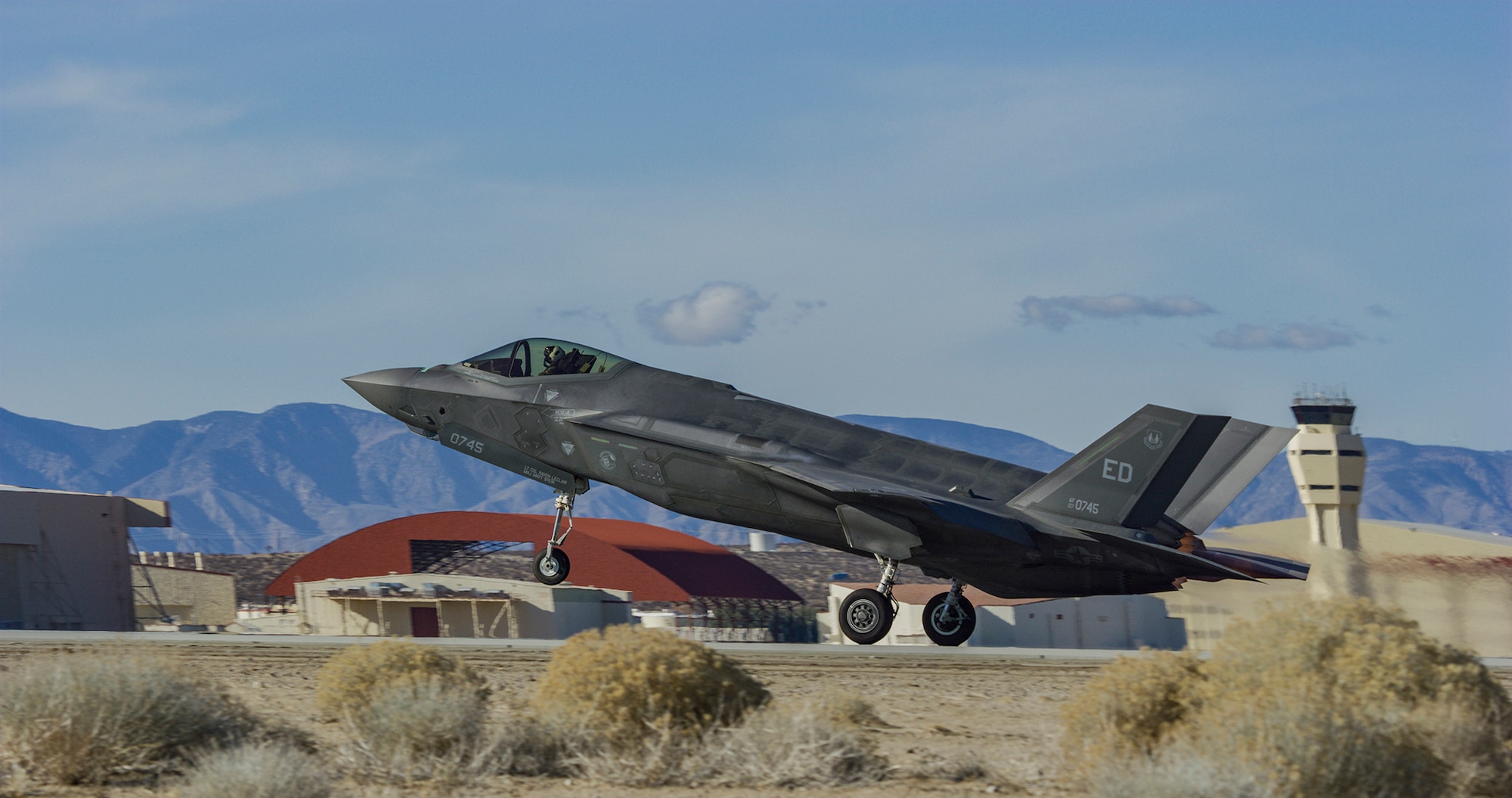An F-35A takes off from Edwards Air Force Base, California, on January 6, 2023. A developmental test team from the 461st Flight Test Squadron conducted the first flight of an F-35 in the Technology Refresh 3 (TR-3) configuration at the base. The 50-minute flight, which took the jet to 35,000 feet at speeds just shy of the speed of sound above the Mojave Desert, marked the start of an extensive flight test campaign. TR-3 provides the computational horsepower to support modernized Block 4 capabilities. The F-35 Joint Program Office is the Department of Defense's focal point for the 5th-generation strike aircraft for the Navy, Air Force, Marines, and our allies. The F-35 is the premier multi-mission, 5th-generation weapon system. Its ability to collect, analyze and share data is a force multiplier that enhances all assets in the battle space: with stealth technology, advanced sensors, weapons capacity, and range. The F-35 has been operational since July 2015 and is the most lethal, survivable, and interoperable fighter aircraft ever built.