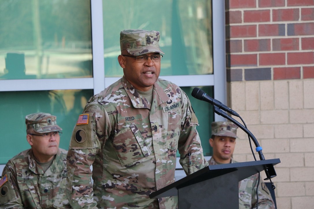 Command Sgt. Maj. Irving Reed Jr. takes responsibility as the Virginia Army National Guard’s top noncommissioned officer from Command Sgt. Maj. Ronald Smith Jr. during a change of responsibility ceremony Jan. 7, 2023, at the Virginia National Guard Sergeant Bob Slaughter Headquarters at Defense Supply Center Richmond, Virginia. Brig. Gen. K. Weedon Gallagher, the Virginia National Guard Land Component Commander, presided over the ceremony. Smith currently serves as the Senior Enlisted Leader to the Commanding General of the District of Columbia National Guard. (U.S. Army National Guard photo by Staff Sgt. Marc Heaton)