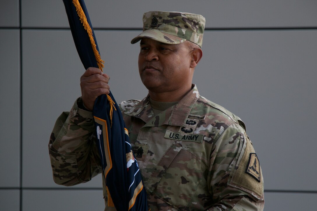 Command Sgt. Maj. Irving Reed Jr. takes responsibility as the Virginia Army National Guard’s top noncommissioned officer from Command Sgt. Maj. Ronald Smith Jr. during a change of responsibility ceremony Jan. 7, 2023, at the Virginia National Guard Sergeant Bob Slaughter Headquarters at Defense Supply Center Richmond, Virginia. Brig. Gen. K. Weedon Gallagher, the Virginia National Guard Land Component Commander, presided over the ceremony. Smith currently serves as the Senior Enlisted Leader to the Commanding General of the District of Columbia National Guard. (U.S. Army National Guard photo by Staff Sgt. Marc Heaton)