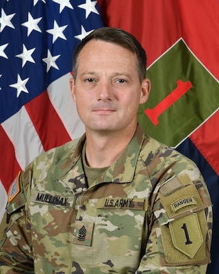 Command Sergeant Major Christopher L. Mullinax enlisted into the Army on June 24, 1998 as an Infantryman.  He attended OSUT at Fort Benning, GA. He served as a Rifleman, Automatic Rifleman, Team Leader, Squad Leader, Platoon Sergeant, First Sergeant, and Command Sergeant Major. 

His duty assignments include 1st, 2d and 3rd Ranger Battalions as well as the 75th Ranger Regiment and the Ranger Special Troops Battalion; 1/503rd, 173rd Airborne Brigade; 2-2 Stryker Brigade Combat Team and most recently the 2nd Security Force Assistance Brigade. He has combat deployments to both Iraq and Afghanistan, and tours across Europe and Africa. 

CSM Mullinax is a graduate of all levels of the NCO Educations System, U.S. Army Sergeants Major Academy Class 66, Combat Advisor Training Course, Airborne, and Ranger Course. His civilian education includes a Bachelor’s Degree in Liberal Arts with an emphasis in History. 

His awards include the Legion of Merit, Bronze Star Medal, Meritorious Service Medal, Joint Service Commendation Medal, Army Commendation Medal, Joint Service Achievement Medal, Army Achievement Medal, and the Expert and Combat Infantry Badges.