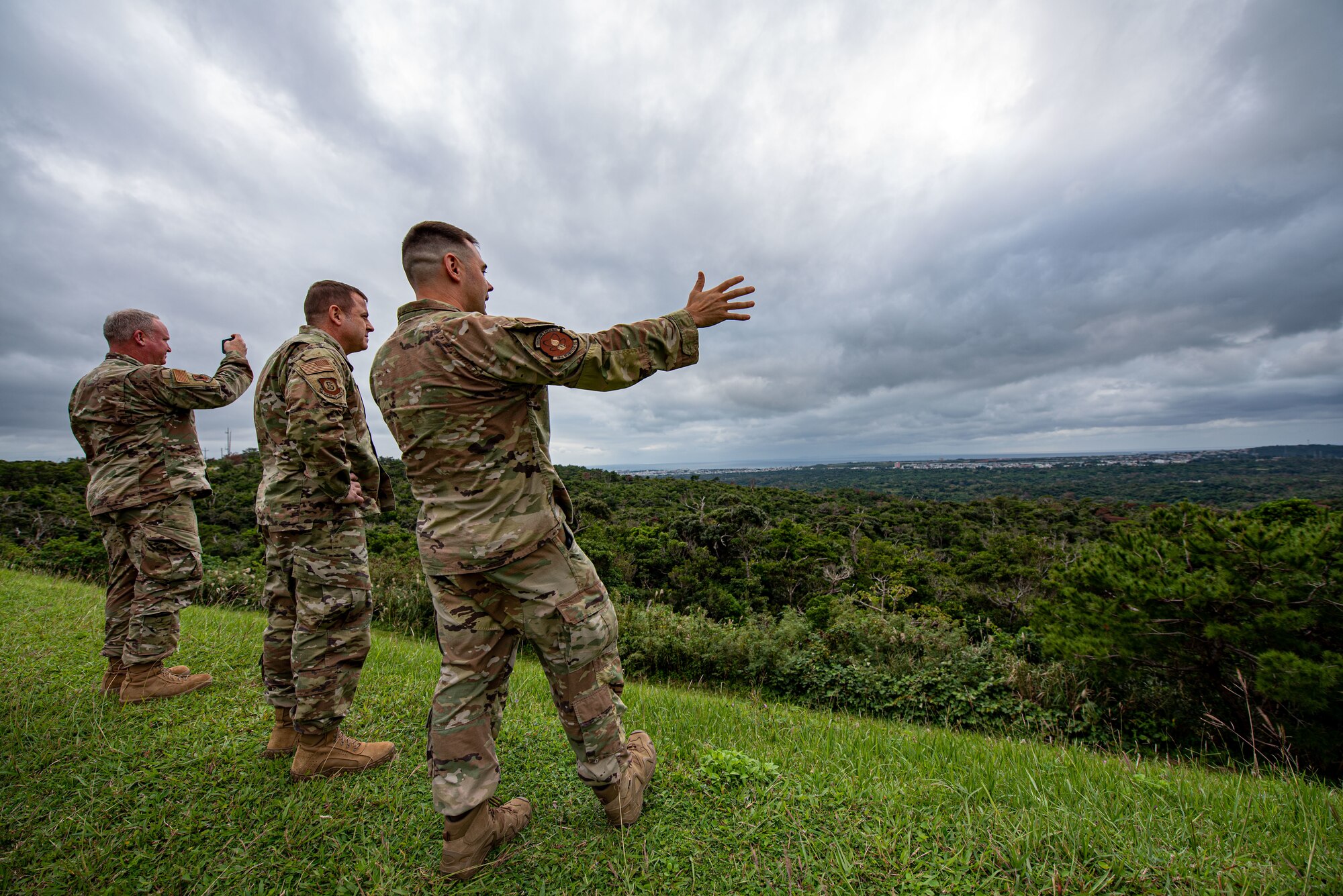 Airmen overlook a munitions storage area.