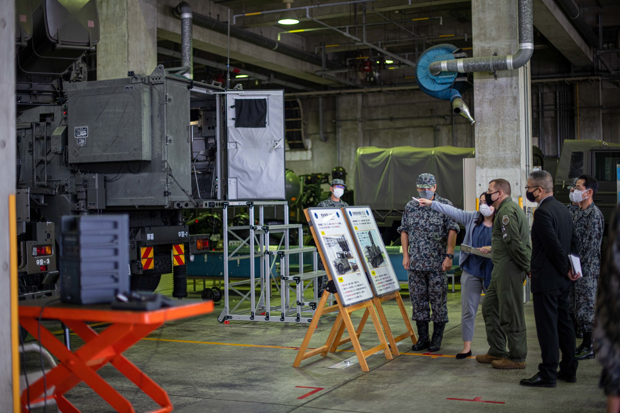 An Airman learns about Japanese vehicles.
