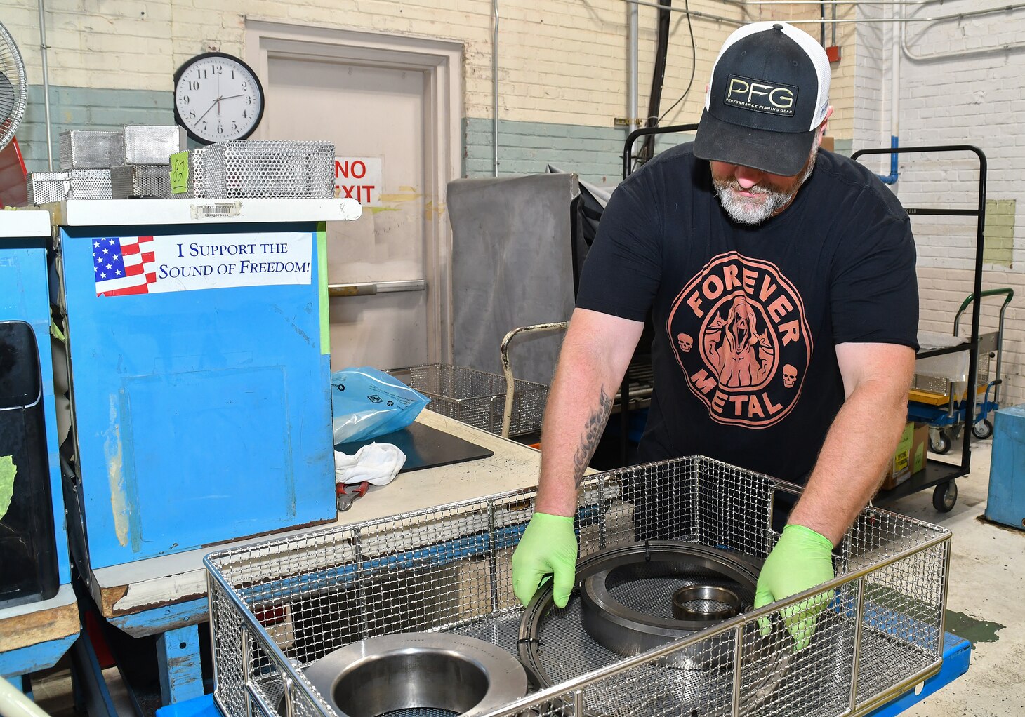 Johnnie Gray, a bearing reconditioner at Fleet Readiness Center East (FRCE), prepares bearings for cleaning inside the depot’s bearing shop.